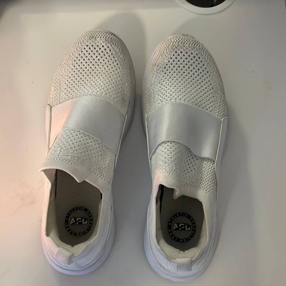 APL white sneakers